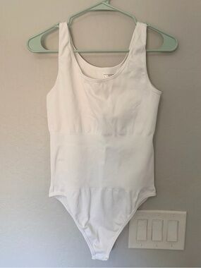 Women’s White Sleeveless One-Piece Bodysuit